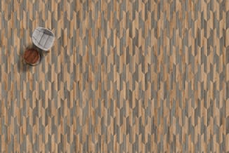 Houten visgraat vloer in grijs en naturel met ronde houten tafel en grijze stoel, bovenaanzicht.