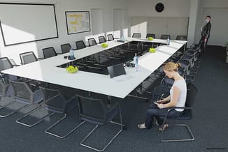 Moderne vergaderruimte met U-vormige witte vergadertafel, zwarte kantinestoelen, gele accessoires en whiteboard aan wand.