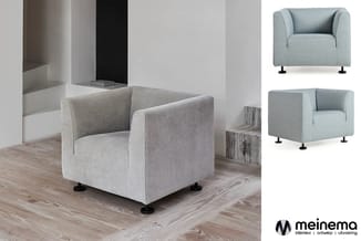Grijze fauteuil met stevig gestoffeerd design, zwarte poten, in minimalistische interieurruimte getoond in meerdere kleuraVar