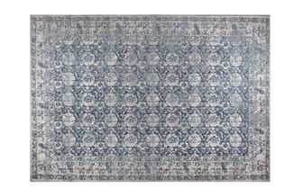 Blauwe vloerkleed met beige bloemmotief en decoratieve rand, klassieke oosterse patroon.