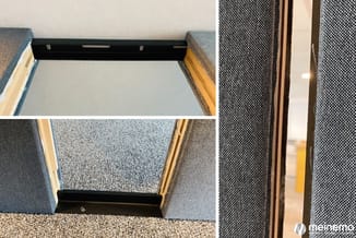 Draagbare akoestische scheidingswand met grijs gemeleerd stofbespanning en houten zijkanten, zwarte metalen beugels, in kanto