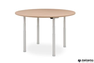 Ronde vergadertafel met natuurlijk houten blad en vier witte verstelbare poten met voetring.
