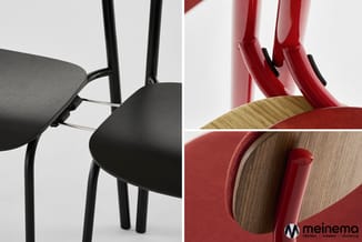 Zwarte en rode stoelen met zwarte metalen poten. Linkerkant toont zwarte stoelen met grijze zitting. Rechterkant toont rode s
