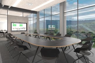Moderne vergaderruimte met ovale tafel in grijs en hout, zwarte stoelen, grote glazen wand, plafondverlichting en displays.