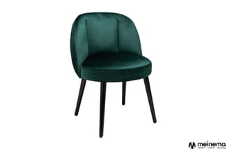 Groene fluwelen stoel met ronde zitting, gebogen rugleuning en zwarte houten poten.