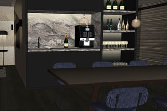Moderne bar met zwart onderkast, marmeren werkblad, ingebouwde espressomachine, wijnflessen en glazen. Blauwe barkrukken aan
