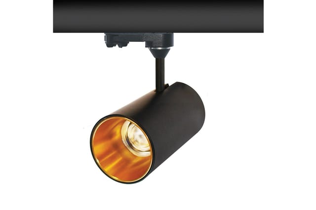Zwarte cilindervormige spotlamp op railsysteem met gouden reflectorkap en ingebouwde ledlamp, aangesloten op zwarte ophangbal