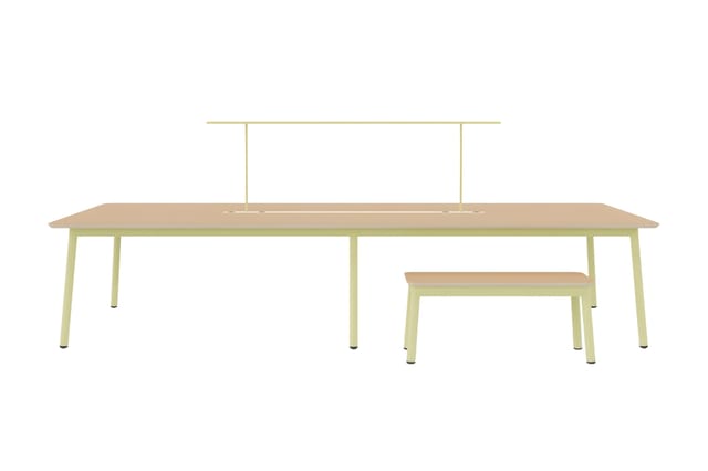 Lange vergadertafel met natuurlijke houten blad en groen metalen frame, met bijpassende bankje ernaast. Inclusief gele hangla