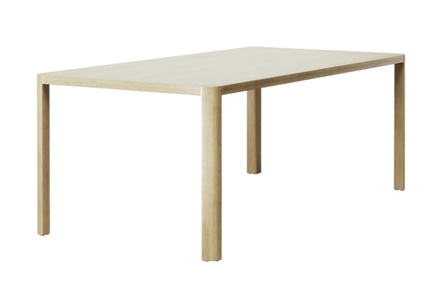 Houten vergadertafel met rechthoekig blad en vier cilindervormige poten in licht houtfinish.